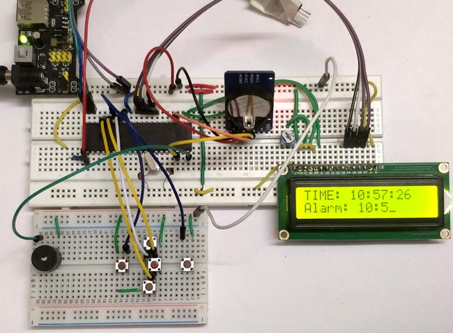 Digital Alarm Clock using PIC Microcontroller Digital Alarm Clock using PIC Microcontroller