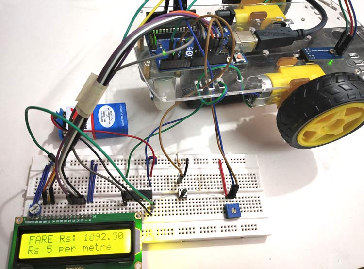 Digital Taxi Fare Meter using Arduino Digital Taxi Fare Meter using Arduino