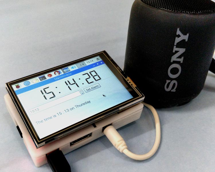 Raspberry Pi based Jarvis themed Speaking Alarm Clock Raspberry Pi based Jarvis themed Speaking Alarm Clock