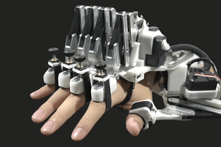 This Exoskeleton for Pianists to Play Faster and Better This Exoskeleton for Pianists to Play Faster and Better